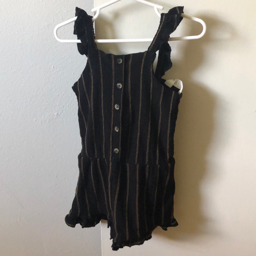 Black romper with gold stripes